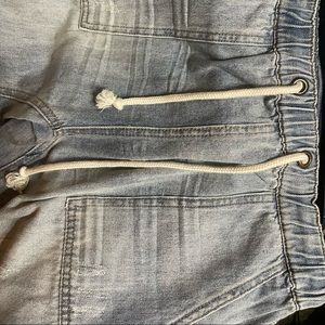 Never worn drawstring cropped distressed jeans